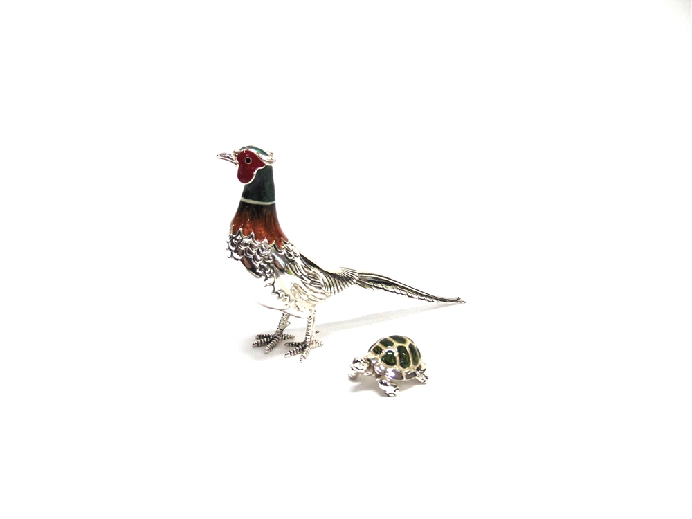 A SATURNO PLATED AND ENAMELLED MODEL OF A PHEASANT 13.7cm long; and a small Saturno plated and