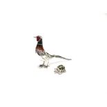 A SATURNO PLATED AND ENAMELLED MODEL OF A PHEASANT 13.7cm long; and a small Saturno plated and