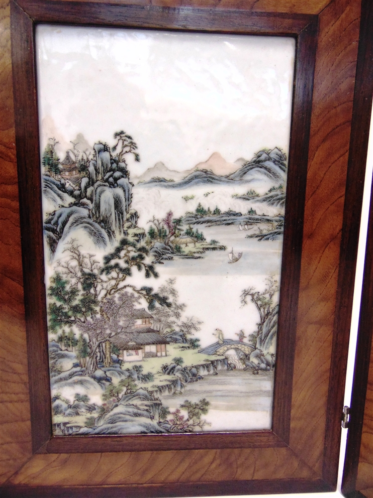 A PAIR OF CHINESE PORCELAIN PLAQUES enamelled with landscape scenes, held in a wooden frame, each - Image 2 of 3