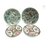 A PAIR OF CHINESE PORCELAIN PLATES with enamelled decoration of birds and butterflies amongst