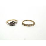 AN 18 CARAT GOLD SEVEN STONE DIAMOND HALF HOOP RING set with seven single cut, finger size R, 2.6g