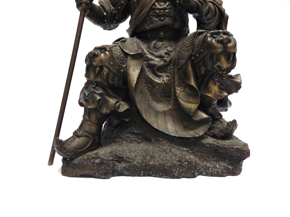 A HEAVY BRONZED METAL FIGURE modelled as a Chinese warrior, seated and holding a pole arm, 51cm - Image 3 of 3