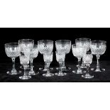 A STUART CRYSTAL PART SUITE OF GLASSES comprising nine wine glasses 12cm high; six sherry glasses