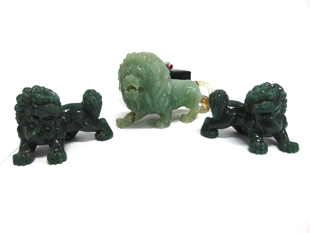 A CARVED JADE FIGURE OF A LION 12cm long, similar pair of Dogs of Fo, and a pendant - Image 3 of 4