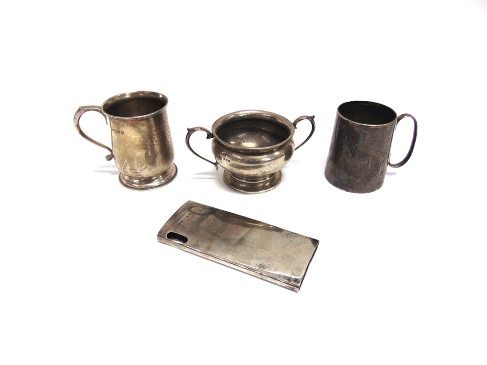 A SILVER CHRISTENING MUG by Aidie Brothers, Birmingham 1924, 8.5cm high, monogrammed; with a