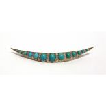 A LATE VICTORIAN TURQUOISE AND DIAMOND CRESCENT BROOCH the thirteen oval cabochons with diamonds