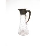 A SILVER MOUNTED GLASS CLARET JUG by Walker & Hall, Sheffield 1913, the hobnail cut clear glass