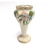 A BELLEEK VASE OF BALUSTER FORM with pierced rim, with polychrome floral decoration, 22cm high,