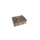 A SILVER TRINKET BOX marks rubbed, of rectangular shaped outline, the lined interior with fitting to