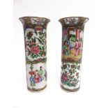 A PAIR OF CHINESE CANTON SLEEVE VASES with flared rims, decorated in the Famille Verte palette, 27cm