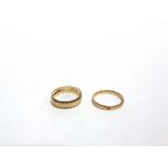 A 9 CARAT GOLD WEDDING RING 3.2g gross; and an unmarked plain wedding ring, 1.9g gross