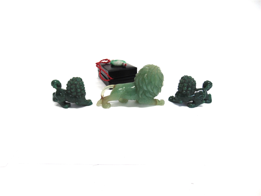 A CARVED JADE FIGURE OF A LION 12cm long, similar pair of Dogs of Fo, and a pendant - Image 4 of 4