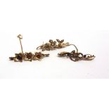 A SEED PEARL SET FLORAL BROOCH 3.5g gross; with two brooches stamped '9ct', 5.5g gross