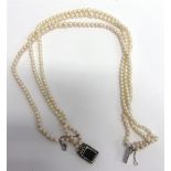 A THREE ROW GRADUATED CULTURED PEARL NECKLACE the 89/96/103 pearls of approximately 3.4mm to 7mm