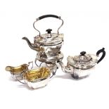 A MATCHED SILVER TEA SERVICE WITH SPIRIT KETTLE By J. Round, Sheffield 1908, kettle 1910, of round