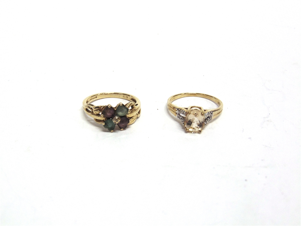 A 9 CARAT GOLD GEM SET DRESS RING finger size O, 1.9g gross; and another gem set 9 carat ring, 2.
