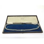 A CULTURED PEARL NECKLACE the 73 pearls of approximately 4-8mm diameter, 51cm long, to a white metal