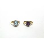 A BLUE TOPAZ AND DIAMOND 9 CARAT GOLD CLUSTER RING and a similar amethyst and diamond cluster