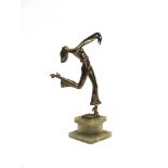 AN ART DECO STYLE FIGURE of a dancing female figure, on onyx base, 34cm high