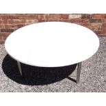 A LARGE CIRCULAR WHITE LAMINATED COFFEE TABLE on turned supports, 118cm diameter 43cm high