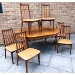 A G-PLAN 'FRESCO' TEAK EXTENDING TABLE AND SIX CHAIRS the table 112cm deep 163cm long (218cm