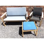 A FINNISH DESIGN TWO SEATER SOFA, CHAIR AND FOOTSTOOL with beech and bent plywood frames, the sofa