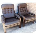 A PAIR OF 1970S DANISH LEATHER UPHOLSTERED ARMCHAIRS with formed laminate frames