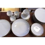 A BING & GRONDAHL EIGHT SETTING DINNER AND TEA SERVICE comprising tea cups, saucers, side plates,