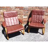 A PAIR OF LEATHER UPHOLSTERE LOUNGE CHAIRS with cantilever bentwood frames