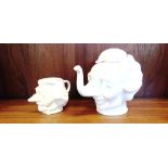 A 'FLUCK AND LAW' MARGARET THATCHER NOVELTY TEAPOT 21cm high and similar jug 11cm high