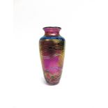 AN OKRA IRIDESCENT ART GLASS VASE of baluster form, etched signature to base, 22cm high