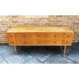 A MEREDEW LIGHT OAK SIDEBOARD/CHEST fitted with six drawers, 168cm long 47cm deep 75cm high