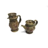 STUDIO POTTERY: A MARTIN HOMER STONEWARE TEAPOT with relief decoration of animals and baskets of