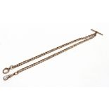A 9 CARAT GOLD WATCH CHAIN OF SOLID CURB LINKS with a T bar, swivel and bolt ring, 47cm long, 32.