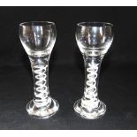 A PAIR OF CORDIAL GLASSES WITH AIR TWIST STEMS 15cm high