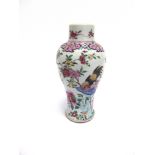 A CHINESE PORCELAIN VASE of baluster form, enamelled decoration depicting a pair of cockerels and