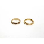 A 22 CARAT GOLD WEDDING RING 6.5 g gross; with a 9 carat gold wedding ring, 2.4g gross