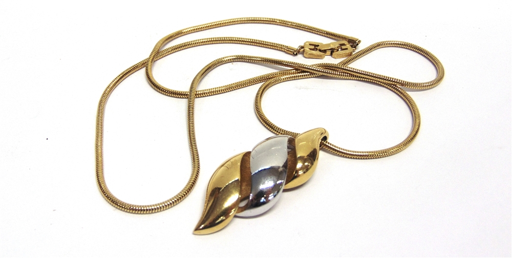 A GIVENCHY TWO COLOUR PENDANT ON A CHAIN stamped with Givenchy, Paris, New York, 1978 and - Image 2 of 2