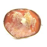 A VICTORIAN SHELL CAMEO BROOCH carved as two females in profile, possibly emblematic of Night and