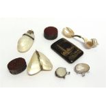 A COLLECTION OF FOUR SHELL PURSES a collection of four shell purses; a shell mounted spoon; a