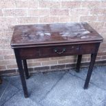 A GEORGE III MAHOGANY TEA TABLE with single frieze drawer on moulded supports, 80cm wide 50cm deep