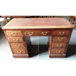 A TWIN PEDESTAL MAHOGANY DESK 122cm wide 53cm deep 77cm high