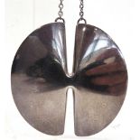 A GEORG JENSEN SILVER PENDANT ON CHAIN to a design by Nanna Ditzel, stamped 337A, Georg Jensen in