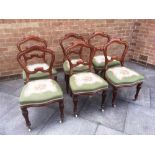 A SET OF SIX VICTORIAN BALLOON BACK DINING CHAIRS with tapestry upholstered serpentine front