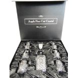 A BOXED ARGYLE FINE CUT CRYSTAL WHISKEY DECANTER SET comprising decanter and six glasses, the