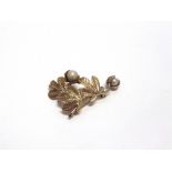 A 9 CARAT GOLD CULTURED PEARL SET HORSE CHESTNUT BROOCH with two pearls forming the 'conkers', one