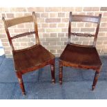 A PAIR OF 19TH CENTURY MAHOGANY ROPE BACK CHAIRS with dished seat on turned supports