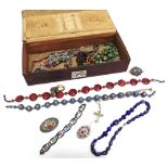 A COLLECTION OF ITALIAN MOSAIC JEWLLERY AND GLASS BEADS housed in a leather case
