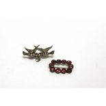 A FRENCH PASTE SET LOVEBIRDS BROOCH and a flat cut garnet brooch