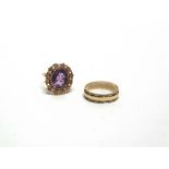 A 9 CARAT GOLD SINGLE STONE AMETHYST RING and a 9 carat gold wedding ring; 5.1g gross